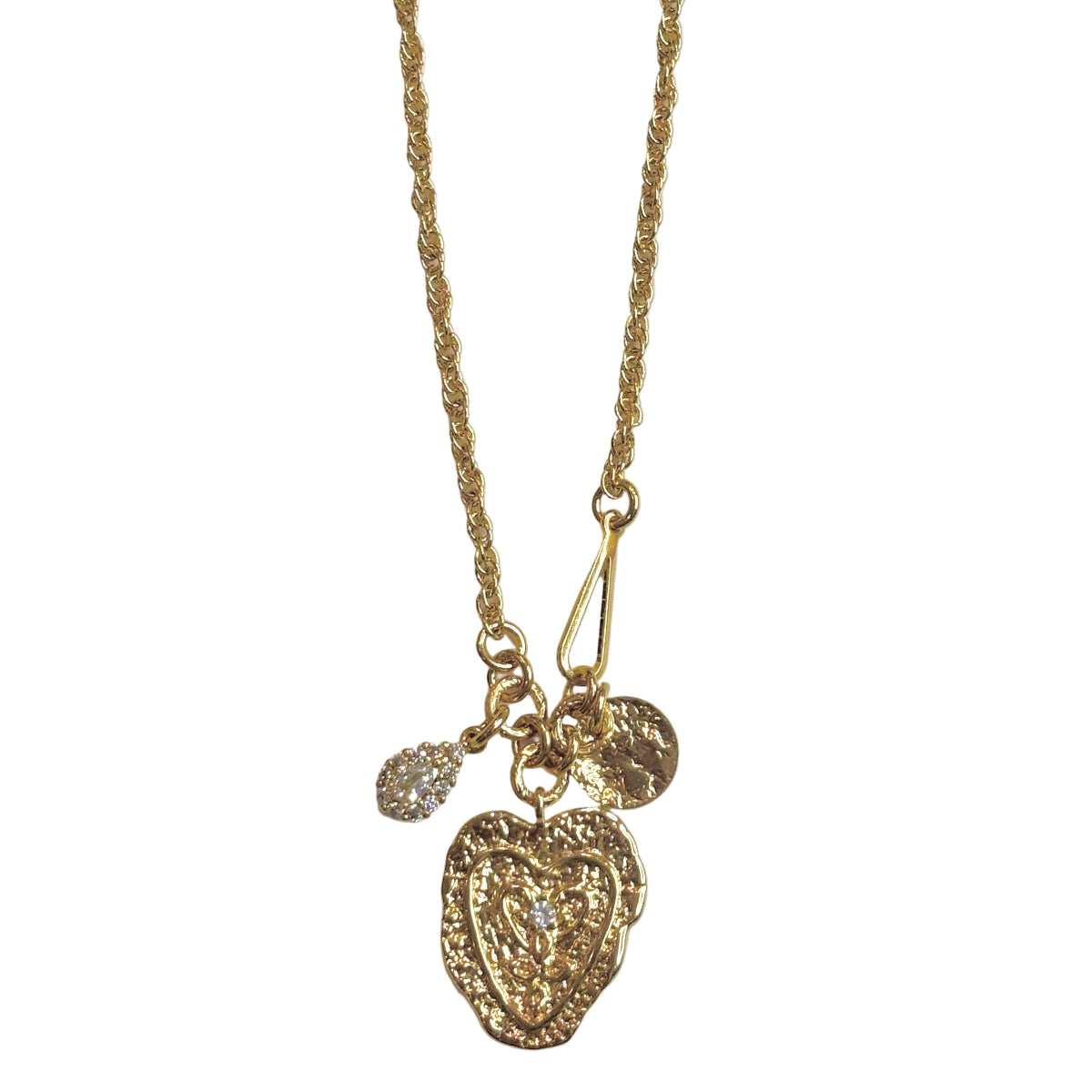 Collier rare pendentif coeur de la créatrice parisienne Virginie Berman
Laiton doré 18k et charms