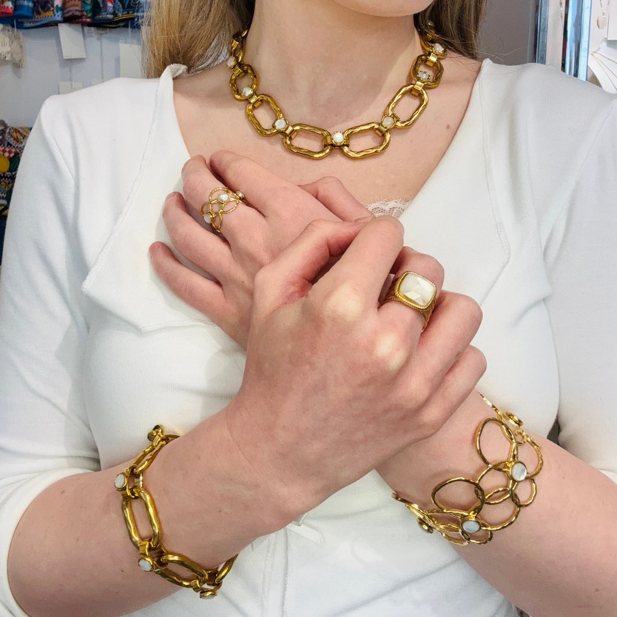 Ensemble de bijoux acier inoxydable et perles blanches oeil de chat