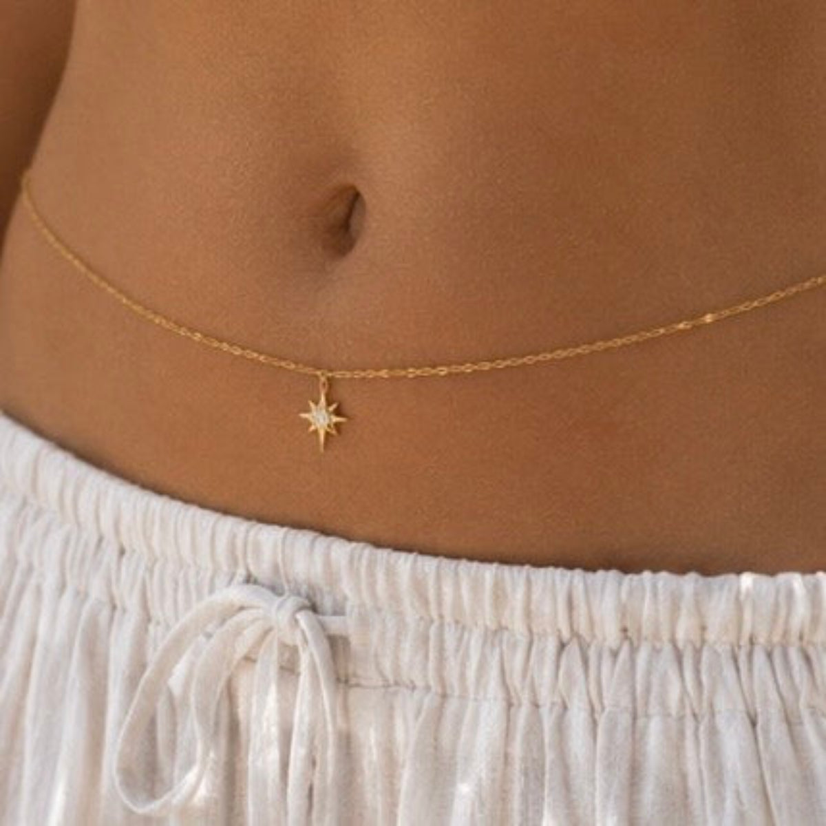 Bijou de corps doré acier inoxydable chaine fine et pendentif étoile sertie
Bijou de taille acier inoxydable doré pampille étoile sertie
Bijou de taille étoile doré
Chaine de ventre acier inoxydable Paris 16
Bijou de corps Bijouterie Paris 16