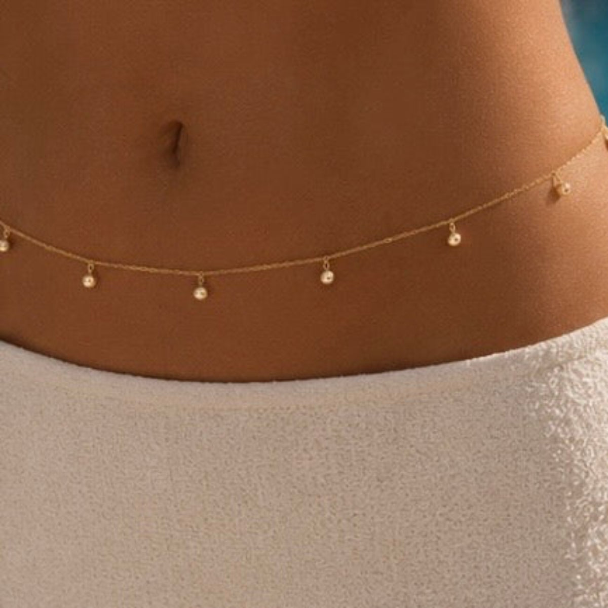 Bijou de taille acier inoxydable doré pampilles gouttes dorées 
Chaine de ventre acier inoxydable pampilles dorées
Bijou de taille tendance doré été
Bijoux tendance été paris 
Bijouterie Paris 16 
Bijou de taille acier inoxydable doré ajustable pampilles