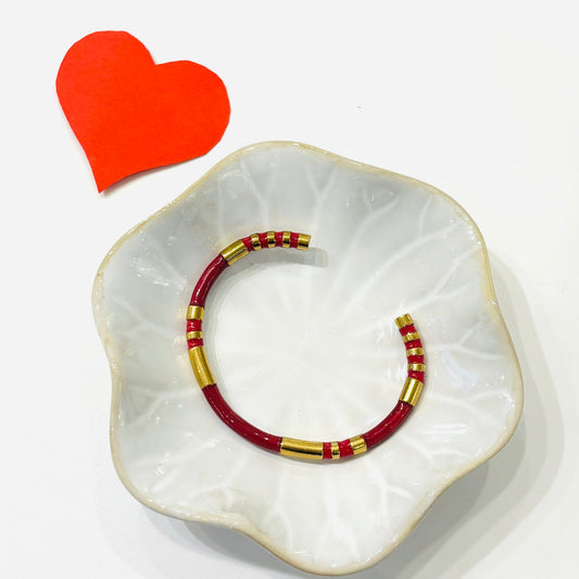 Bracelet jonc Eros en acier inoxydable gris collection
Coloris doré et Bordeaux