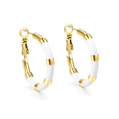 Boucles d'oreilles créoles acier inoxydable émait blanc et doré
Pour oreilles percées