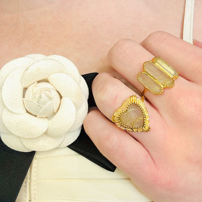 Bagues plaqué or 18 carats 3 microns pierres naturelles 
Au fil de Lo
Bague coeur et bague trois baguettes quartz rutil d'or Au fil de Lo 
Tailles ajustables