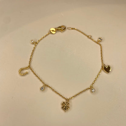 Bracelet Montaigne plaqué or et charms