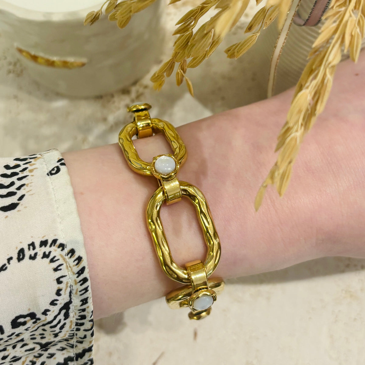 Bracelet grosse chaine acier inoxydable doré et oeil de chat blanc