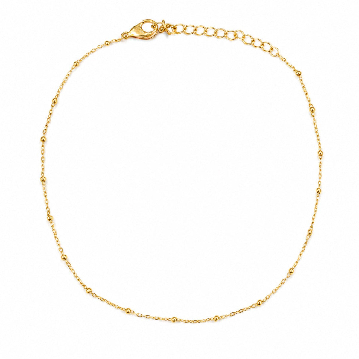 Bracelet de chaine en acier inoxydable doré ajustable avec détails discrets boules dorées
Chaine de cheville dorée en acier inoxydable
Bracelets de cheville été paris bijouterie fantaisie paris 16