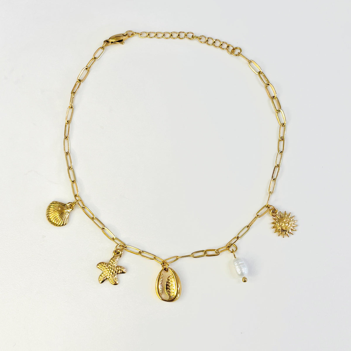 Bracelet de cheville été en acier inoxydable doré avec pampilles charms été coquillages, soleil, étoile de mer et véritable perle d'eau douce
Bracelet de cheville tendance été ajustable anneaux de rappel acier inoxydable
Bijou tendance été 2026
Chaine de cheville été en acier inoxydable et charms coquillages été et perle d'eau douce véritable
bijoux été acier inoxydable tendance 
bijouterie paris 16