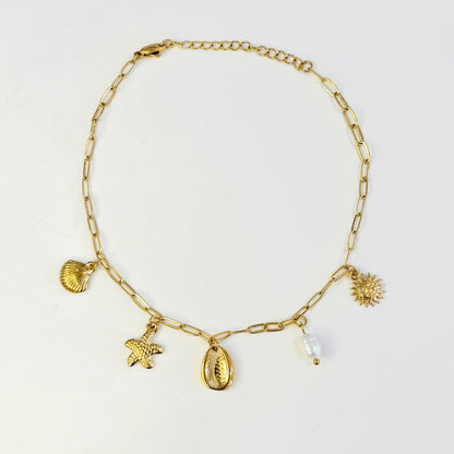 Bracelet de cheville été en acier inoxydable doré avec pampilles charms été coquillages, soleil, étoile de mer et véritable perle d'eau douce
Bracelet de cheville tendance été ajustable anneaux de rappel acier inoxydable
Bijou tendance été 2026
Chaine de cheville été en acier inoxydable et charms coquillages été et perle d'eau douce véritable
bijoux été acier inoxydable tendance 
bijouterie paris 16