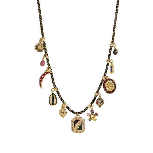 Collier Sautoir Jina noir 
Cordon noir et lurex doré, charms dorés et multicos