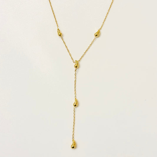 Collier en Y acier inoxydable doré gouttes dorées ajustable grace à ses anneaux de rappel 