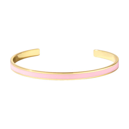 Le jonc de la ligne Bangle est un bijou Iconique de la marque. Sa forme pure et intemporelle en fait une pièce véritablement incontournable.

Amusez-vous à accumuler les joncs Bangle pour créer des combinaisons uniques et élégantes à votre poignet !

Comme tous nos joncs, il est ajustable pour s'adapter au mieux à tous les poignets.

- Jonc en laiton, finition or et laque colorée.
- Taille unique car modèle ajustable.
- Largeur : 0,44 cm.
- Diamètre du jonc : 6 cm.